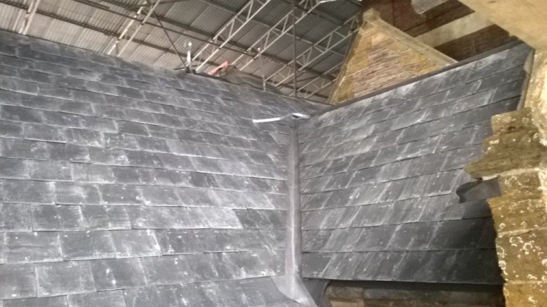 The finished product; beautiful lead-capped grey slates roofs over a fully restored, sealed and insulated structure. As crisp and long-lasting as the day these gables and roofs were first built nearly 500 years ago. 