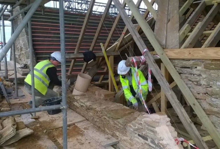The structurally unsound south east gable, built c. 1900 was in danger of collapse without this full rebuilding using the original materials.