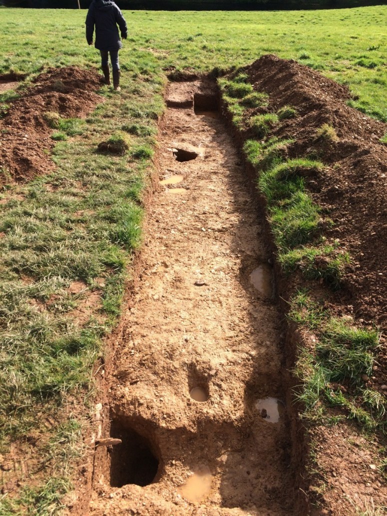 The Druid’s Hut 2015: Archaeology by Mr. James Brigers which has revealed the original postholes which allow for an accurate circumference of the building and therefore the full dimensions for re-construction. 